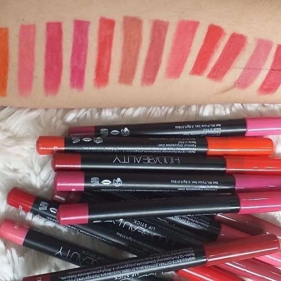 Huda Beauty Jumbo Matte Lip Liners in a pack of 12, showcasing various vibrant shades and sleek packaging.